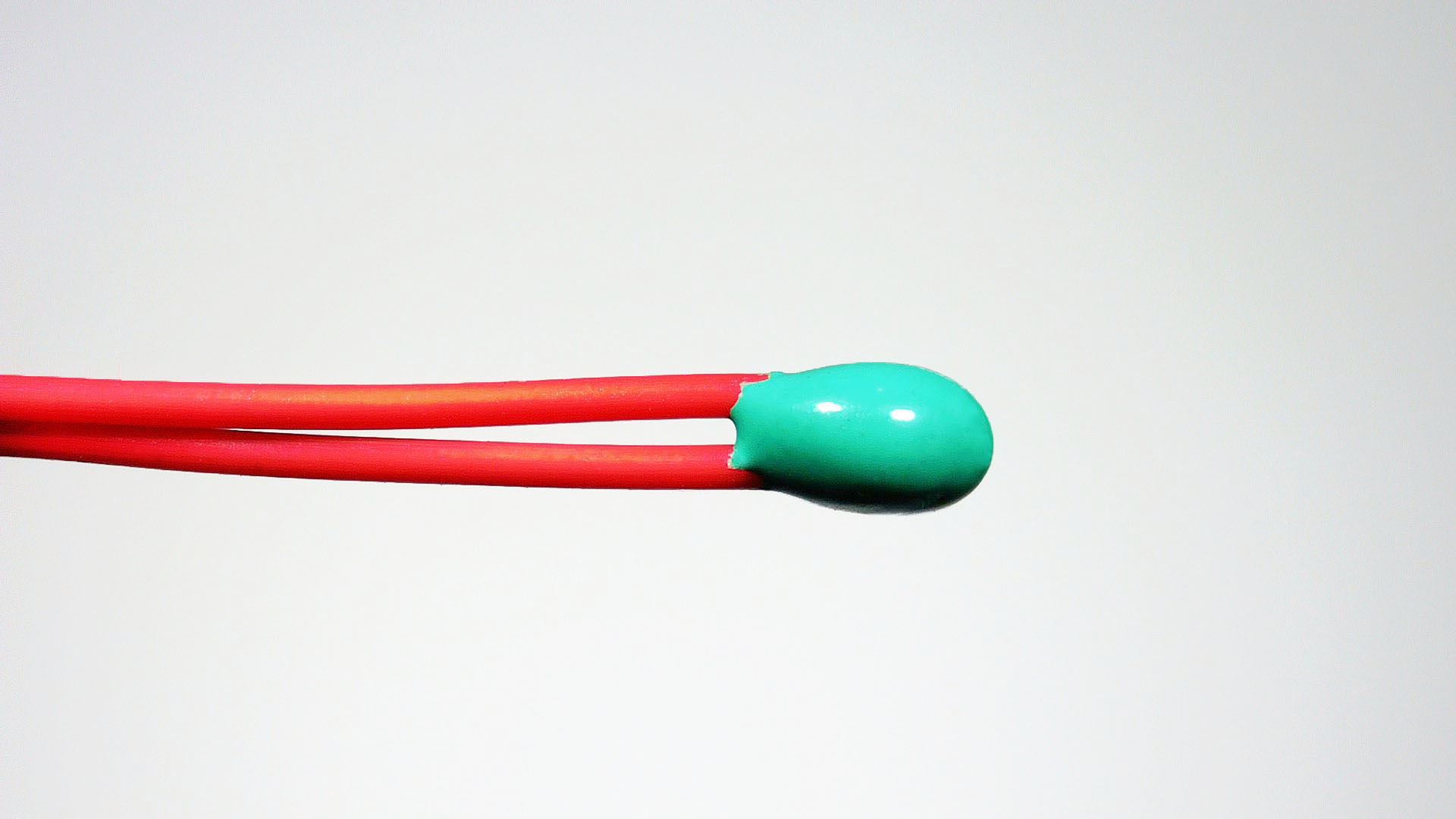 Epoxy-coated thermistor with red insulated leads